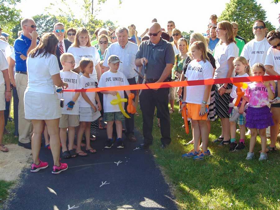 Ribbon cutting of the first born learning trail